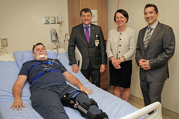 In the picture: Gilles Lanteigne, the Network's President and CEO; Michelyne Paulin, the Network's Board Chair; and Dr. Matthieu Gaudet, Medical Director, respirologist and sleep specialist, at the bedside of an extra simulating a patient.